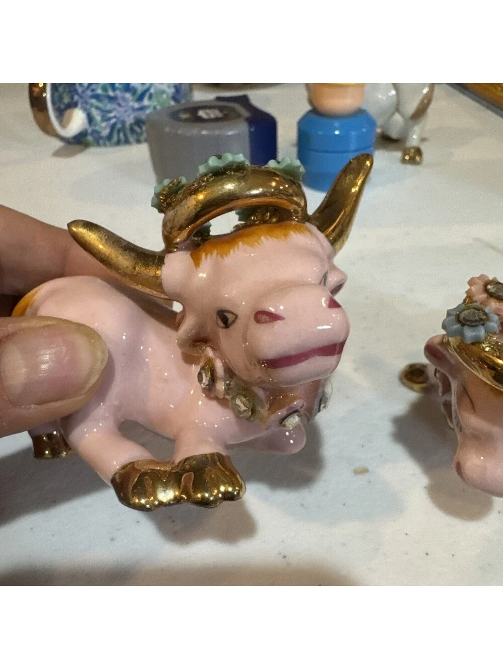 1950s pink and gold ceramic cow and bull salt and pepper shakers